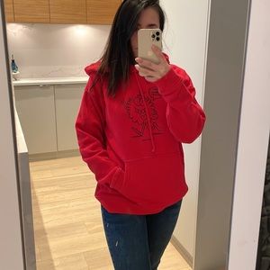 Aritzia TNA X Kevin Lyons red hoodie 
Love's Gonna Getcha!